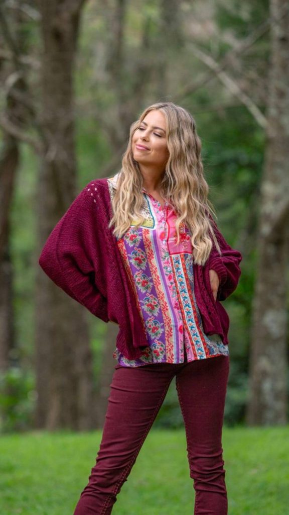 Wine cardigan with colourful top and wine pants