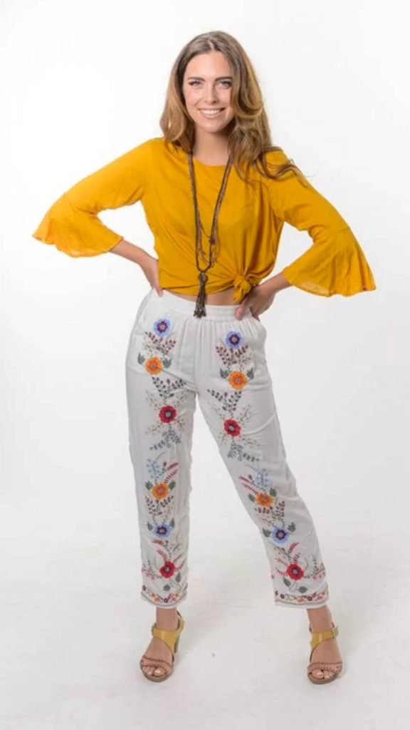 White pants with floral details bohemian style at Gidgets