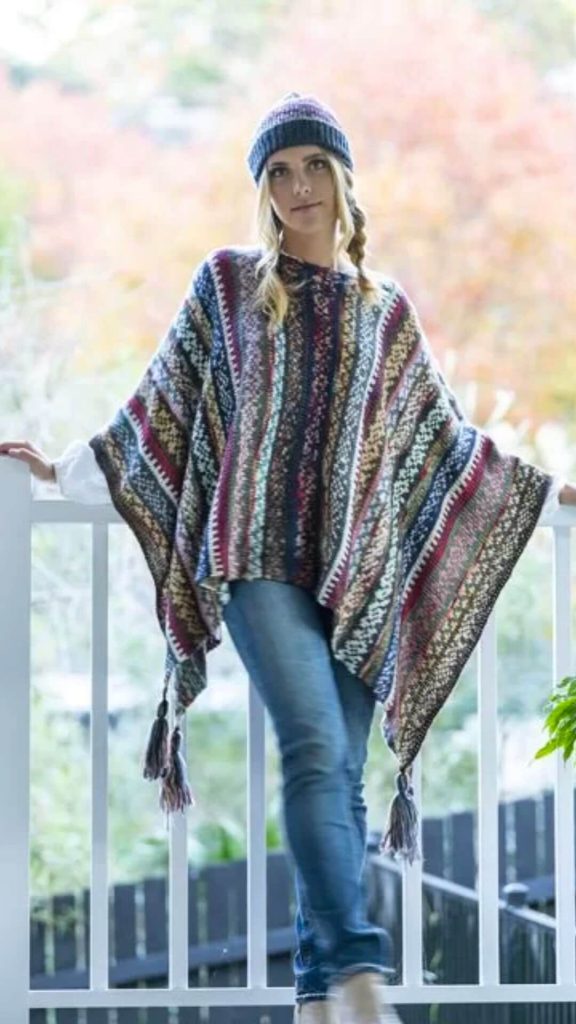 Boxy striped knit poncho by Cienna Designs