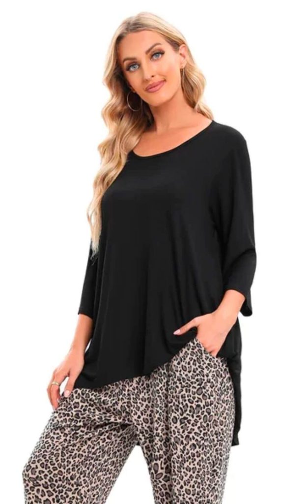 Cotton Village black 3/4 sleeves top worn with leopard pants