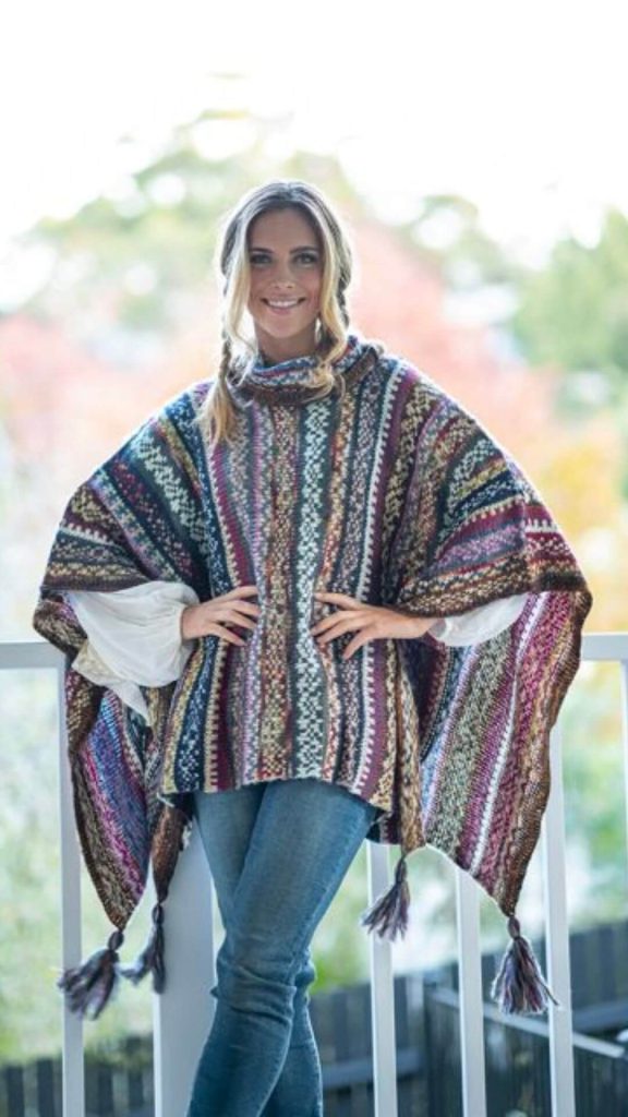 Colourful boho style poncho with jeans