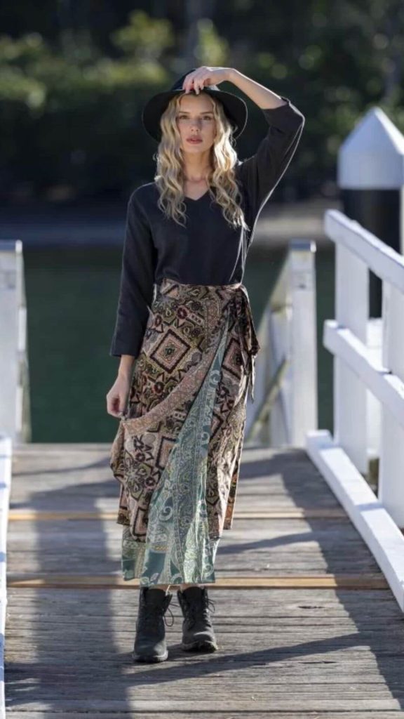 Reversible boho style wrap skirt with black top boots and fedora hat